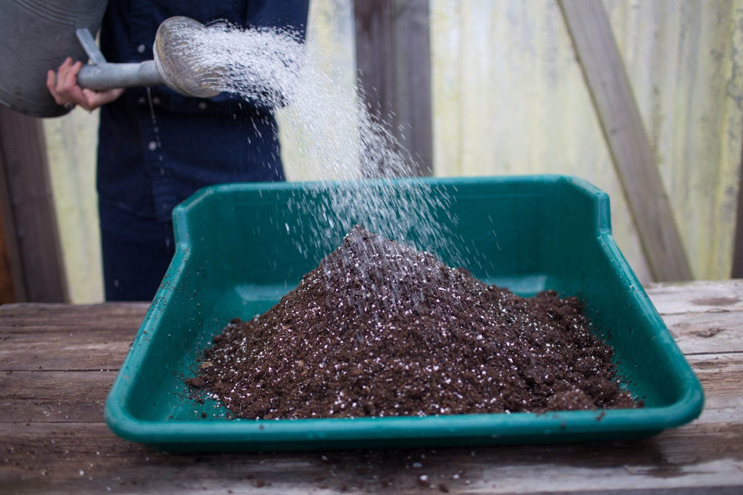 Mixing potting soil at Floret